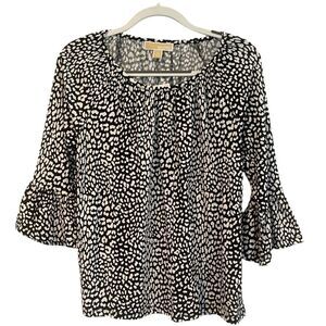 Micheal Kors- flute sleeve blouse Size: Medium Color: Black/ White